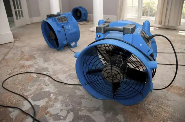 A dehumidifier running during dry-down in a Malibu, CA home