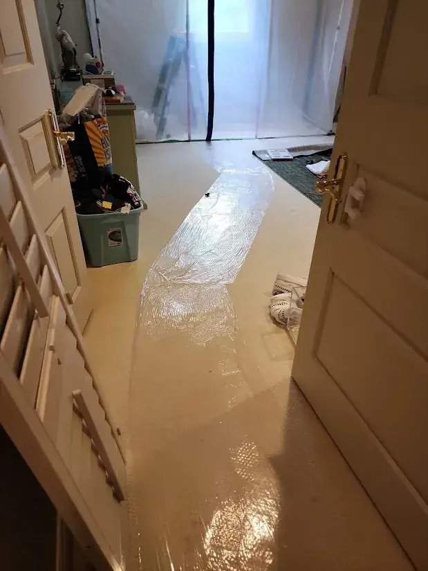 Extracting standing water from a flooded room in a Malibu, CA home