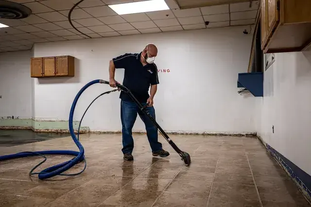 Air movers drying a water damaged Malibu home